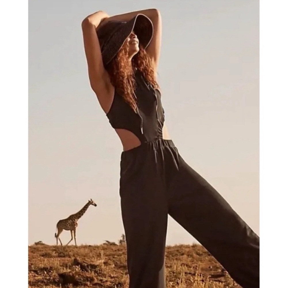 NWOT Free People Movement Take Your Best Shot Onesie size L